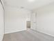 Bright bedroom with neutral walls, carpet, and a walk-in closet at 1893 Rafton Rd, Apopka, FL 32703