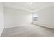 Spacious bedroom with neutral carpeting and bright natural light at 1893 Rafton Rd, Apopka, FL 32703