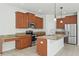 Kitchen with granite countertops, stainless steel appliances, and ample cabinet space at 1893 Rafton Rd, Apopka, FL 32703