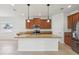 Kitchen with granite countertops, stainless steel appliances, and ample cabinet space at 1893 Rafton Rd, Apopka, FL 32703
