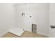 A clean laundry room with tile floor and a wire rack shelf at 1893 Rafton Rd, Apopka, FL 32703