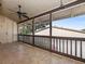 Enclosed lanai has tile floor, a ceiling fan, and a view of the yard and community at 200 Maitland Ave # 228, Altamonte Springs, FL 32701