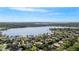 Expansive aerial view showcasing the community, nearby lakes, and lush Florida landscape at 2008 Water Key Dr, Windermere, FL 34786