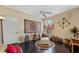 Charming bedroom featuring a mandala tapestry, eclectic decor and dark hardwood floors at 2008 Water Key Dr, Windermere, FL 34786