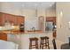 Bright kitchen featuring breakfast bar, stainless steel appliances, and lots of cabinet space at 2008 Water Key Dr, Windermere, FL 34786