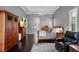 This main bedroom boasts a king bed, ceiling fan, and wood floors at 2008 Water Key Dr, Windermere, FL 34786