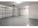 Spacious two-car garage with a clean, epoxy-coated floor, providing ample parking and storage space at 2189 Weatherly Way, Orlando, FL 32820