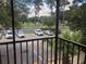 View from balcony overlooking the parking lot at 2597 Oak Park Way # 205, Orlando, FL 32822