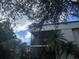Exterior of a two-story building with a balcony at 2597 Oak Park Way # 205, Orlando, FL 32822