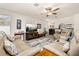 Inviting living room with lots of seating and natural light, perfect for relaxation and entertainment at 2817 Noble Crow Dr, Kissimmee, FL 34744