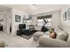 Bonus room with neutral carpet, comfortable seating, exercise equipment and natural light at 2817 Noble Crow Dr, Kissimmee, FL 34744