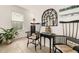 Cozy sitting area with decorative mirror, potted plant, and comfortable chairs at 2817 Noble Crow Dr, Kissimmee, FL 34744