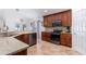 Spacious kitchen featuring granite countertops, stainless steel appliances, and ample cabinet space at 3006 Mandolin Dr, Kissimmee, FL 34744