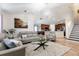 Open floor plan with a view of the living room, dining area, and kitchen at 3006 Mandolin Dr, Kissimmee, FL 34744