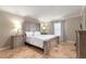 Neutral bedroom with a decorative bedframe and crown molding at 3006 Mandolin Dr, Kissimmee, FL 34744