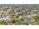 Extensive aerial view of the neighborhood highlighting nearby lakes, parks, and mature trees at 344 Sandpiper Dr, Casselberry, FL 32707