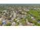 An expansive aerial view of the neighborhood, showcasing the lush tree canopy at 344 Sandpiper Dr, Casselberry, FL 32707