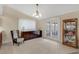 Neutral dining room with dark wood buffet, light fixture and bright, airy feel at 344 Sandpiper Dr, Casselberry, FL 32707