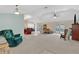 Spacious living room with white carpet and ceilings, recessed lighting, and stylish furniture at 344 Sandpiper Dr, Casselberry, FL 32707