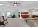 Large living room with a kitchen area and a variety of seating options at 344 Sandpiper Dr, Casselberry, FL 32707