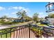Charming neighborhood street view with well-maintained homes and manicured lawns on a sunny day at 352 Misty Oaks Run, Casselberry, FL 32707