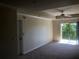 Bright and airy living room featuring a ceiling fan and a sliding glass door to the balcony at 3714 Palm Desert Ln # 5337, Orlando, FL 32839