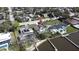 Aerial view of waterfront property with private pool, backyard and dock for boating and relaxation at 382 Riverside Dr, Ormond Beach, FL 32176