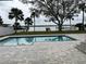 Backyard swimming pool with a waterfront view and a patio of pavers at 382 Riverside Dr, Ormond Beach, FL 32176