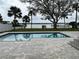 Backyard swimming pool with a waterfront view and a patio of pavers at 382 Riverside Dr, Ormond Beach, FL 32176