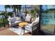 Relaxing outdoor deck with comfortable seating, offering a scenic view of the waterfront at 382 Riverside Dr, Ormond Beach, FL 32176
