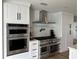 Gourmet kitchen featuring stainless steel appliances and custom cabinetry at 382 Riverside Dr, Ormond Beach, FL 32176