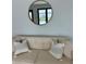 Cozy living room with lake view reflection in mirror at 382 Riverside Dr, Ormond Beach, FL 32176