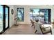 Bright and airy living room offers waterfront views, modern furniture, and stylish decor at 382 Riverside Dr, Ormond Beach, FL 32176