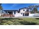A waterfront home featuring a private pool, deck, patio, and lush landscaping at 382 Riverside Dr, Ormond Beach, FL 32176