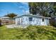 Charming backyard with a patio, perfect for relaxation and entertaining at 430 E Crystal Lake St, Orlando, FL 32806