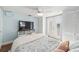 Comfortable bedroom with ample closet space, french doors, and a flat screen TV at 430 E Crystal Lake St, Orlando, FL 32806