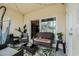 Relaxing covered patio with comfortable seating, perfect for outdoor enjoyment and entertaining at 4715 Coral Castle Dr, Kissimmee, FL 34746