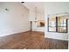 Open living room with laminate floors and a large window for ample natural light at 545 Ne 45Th Ct, Ocala, FL 34470
