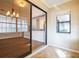 Bright sunroom with tile flooring, open to dining room with sliding glass door at 545 Ne 45Th Ct, Ocala, FL 34470