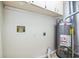 This utility room features storage cabinets and water heater at 545 Ne 45Th Ct, Ocala, FL 34470