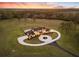 Panoramic aerial view showcasing a grand estate with a pool, circular drive, and beautifully landscaped grounds at 5500 State Road 33, Clermont, FL 34714