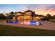 Inviting backyard oasis featuring a sparkling pool with patio furniture, perfect for outdoor relaxation at 5500 State Road 33, Clermont, FL 34714