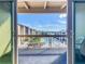 Balcony view showcases the pool, courtyard, and waterway of the community at 562 Orange Dr # 33, Altamonte Springs, FL 32701