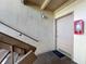 Exterior shot of the unit entrance with door number 33, staircase, and exterior lighting at 562 Orange Dr # 33, Altamonte Springs, FL 32701