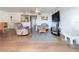 Comfortable living room with wood-look flooring, neutral-toned furniture, and a ceiling fan at 562 Orange Dr # 33, Altamonte Springs, FL 32701