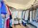 Spacious walk-in closet featuring built-in shelving and ample storage for clothing and accessories at 562 Orange Dr # 33, Altamonte Springs, FL 32701