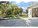 Beautiful backyard featuring a basketball hoop and lush landscaping offering a serene outdoor space at 5950 Masters Blvd, Orlando, FL 32819