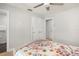 Cozy bedroom featuring natural light, neutral paint and comfortable furnishings at 5950 Masters Blvd, Orlando, FL 32819