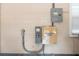 Close-up of the property's electric panel and transfer switch, ensuring reliable power management at 5950 Masters Blvd, Orlando, FL 32819