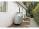 Exterior view showcasing propane tanks, providing essential fuel for the property's appliances at 5950 Masters Blvd, Orlando, FL 32819